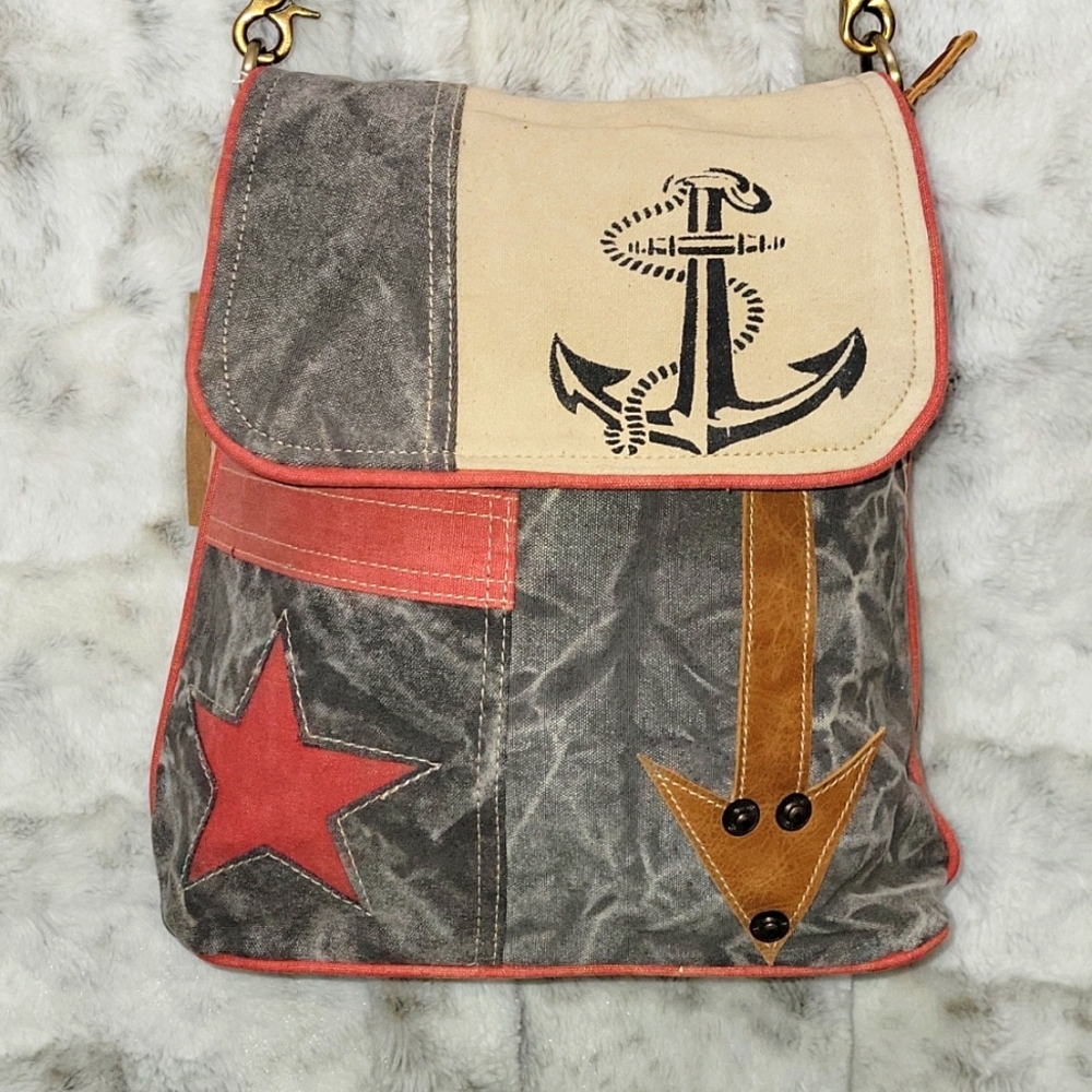 Army repurposed tent and tarps material. Crossbody purse with ancor and star.